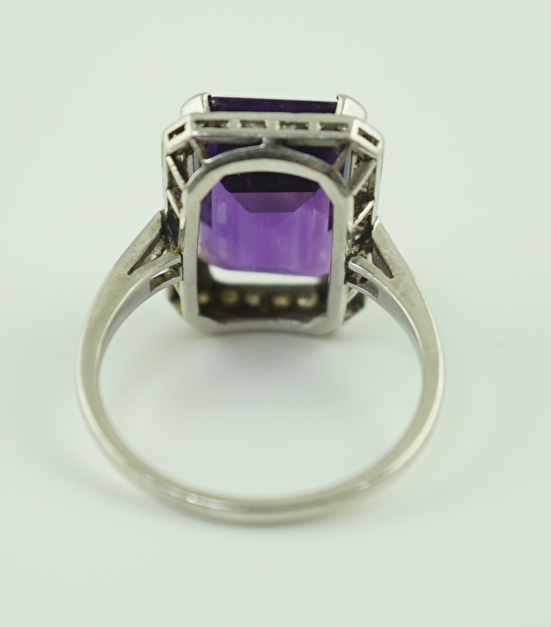 A mid 20th century platinum?, amethyst and diamond set cluster ring